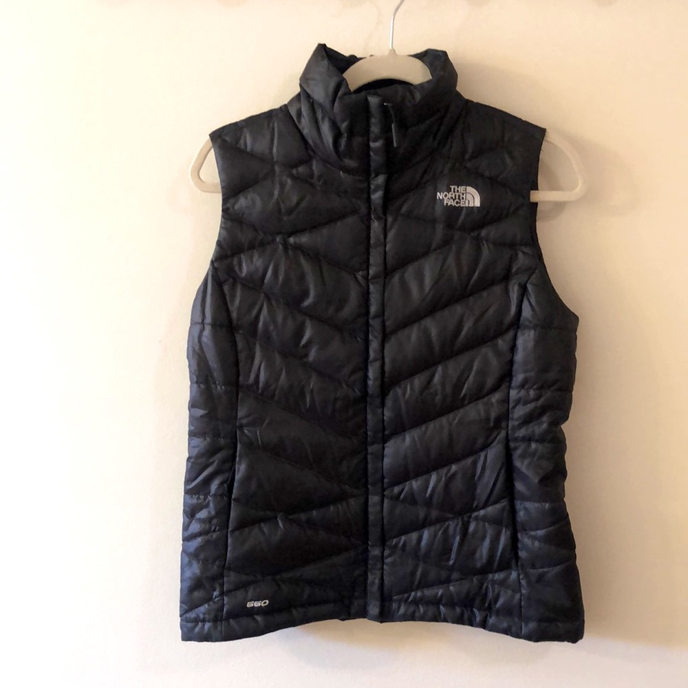 Like new. The NorthFace 550 vest